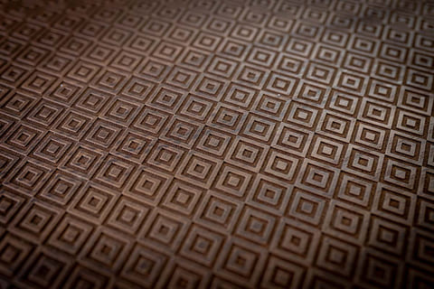 Wooden surface with a laser-marked pattern