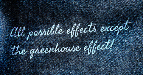 Denim panel engraved with the words “All possible effects except the greenhouse effect!”