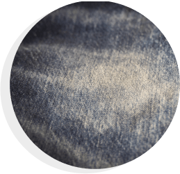 Close-up of denim with a laser-made vintage effect